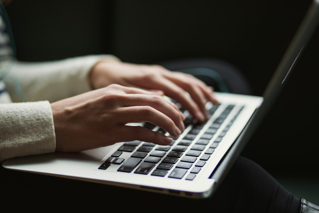 person using laptop for research