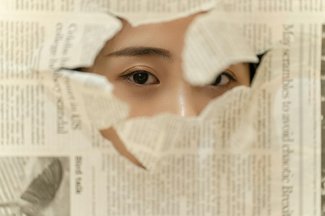 person shielding mind from fake news